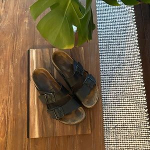 Women’s black Arizona Birkenstocks